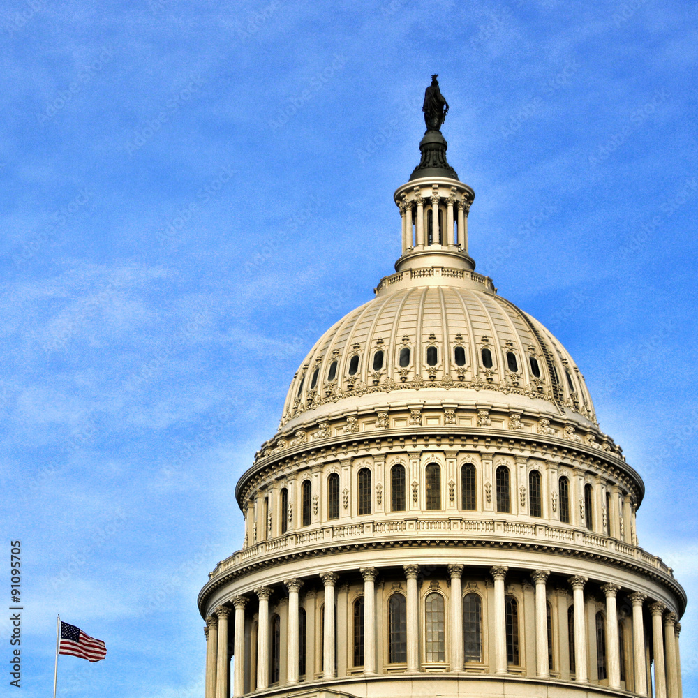 Obraz premium Dome of the Capitol building and American flag