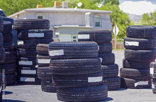 Plenty of Brand New Tires Located Outside of the Auto Repair Sho