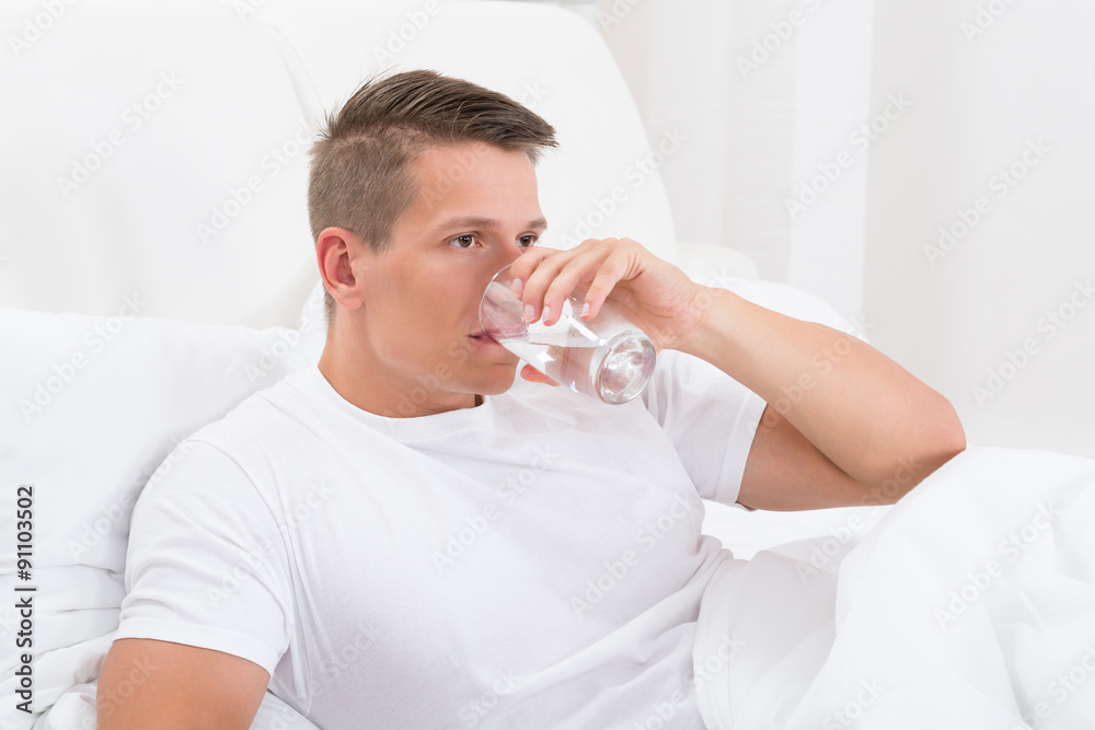 Young Man Drinking Water Young Man Drinking Water