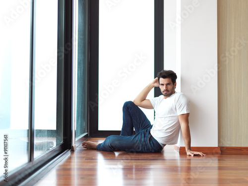 relaxed young man drink first morning coffee