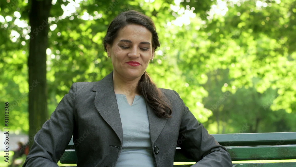 Businesswoman finish working on laptop and relaxing in the park
Businesswoman finish working on laptop and relaxing in the park