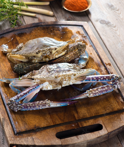 raw crabs with spices for cooking preparation photo