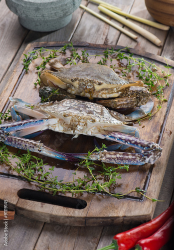 raw crabs with spices for cooking preparation photo