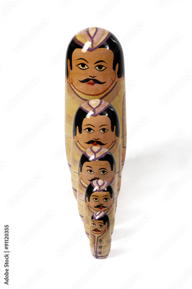Russian doll with typical row isolated on white Russian doll with typical row isolated on white