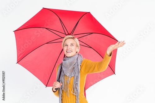 Woman checking to see if its raining