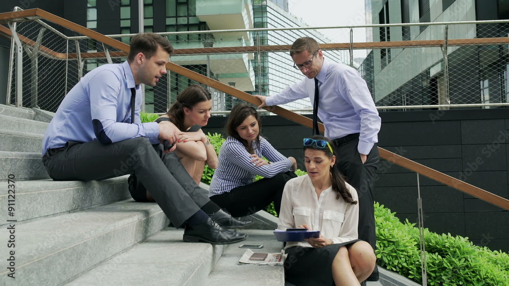 Businesspeople working together on documents, steadycam shot
Businesspeople working together on documents, steadycam shot