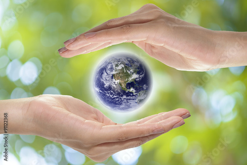 Fototapeta Naklejka Na Ścianę i Meble -  Save earth concept,,Elements of this image furnished by NASA.
