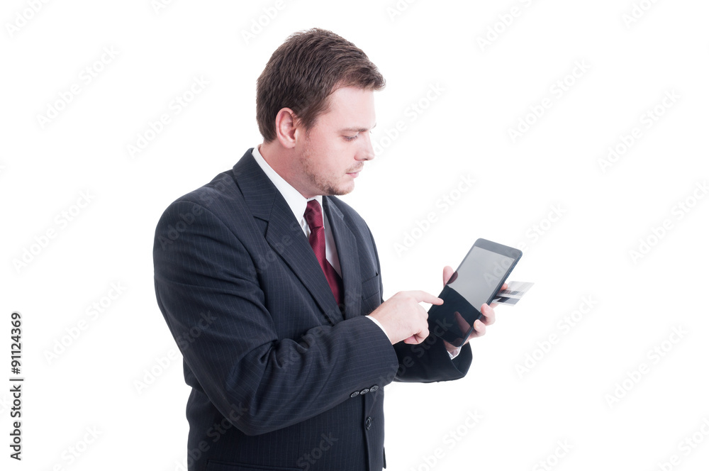 E-commerce, e-banking concept with businessman holding tablet an E-commerce, e-banking concept with businessman holding tablet an