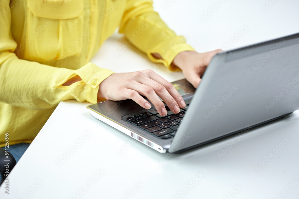 close up of woman with laptop computer in office close up of woman with laptop computer in office