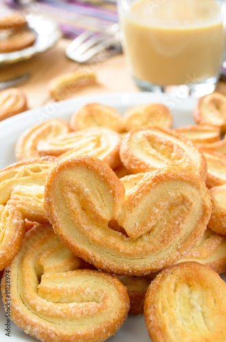 Palmeras - sweet puff pastry. Heart shaped cookies with sugar