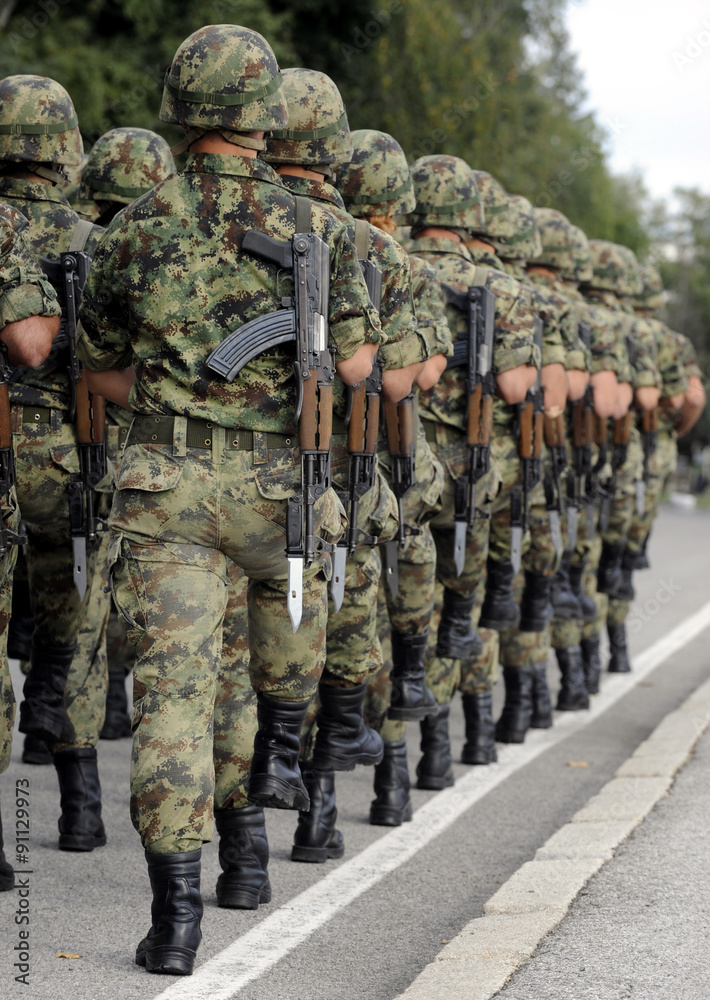 Soldiers marching with rifles Soldiers marching with rifles