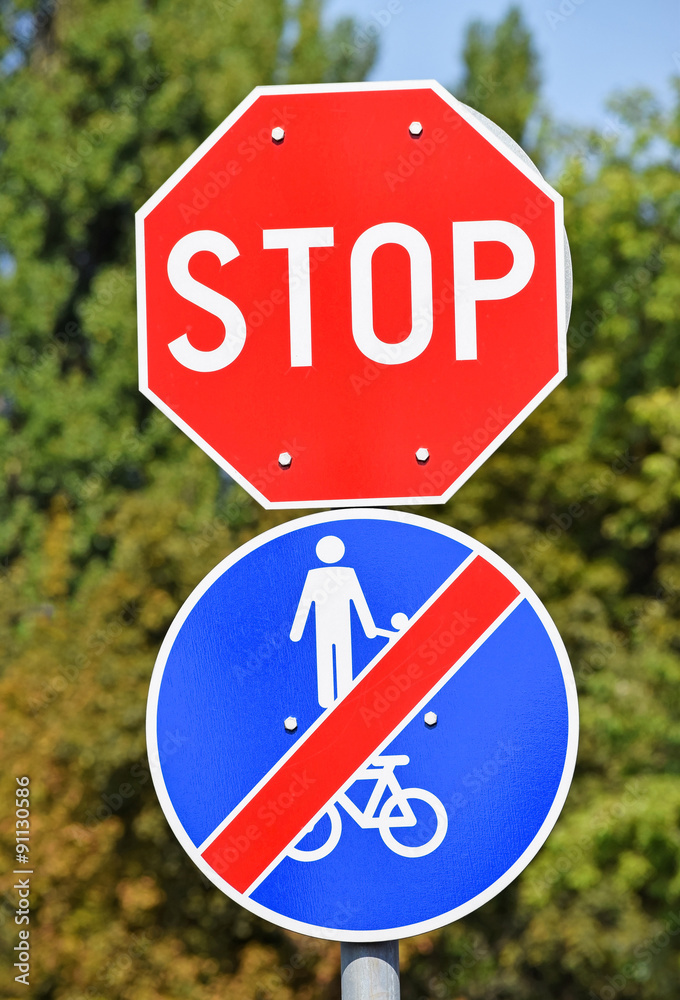 Stop sign at the road crossing