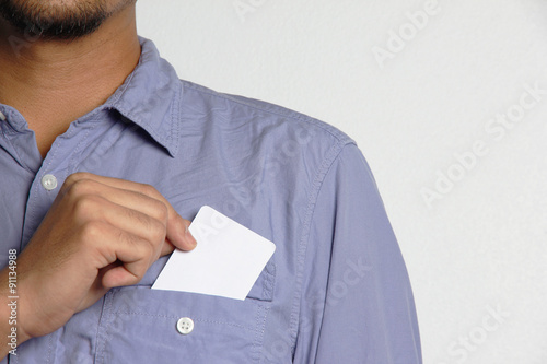man holding a blank card