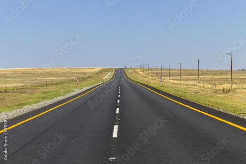 Road Straight highway through rural countryside landscape © ChrisVanLennepPhoto