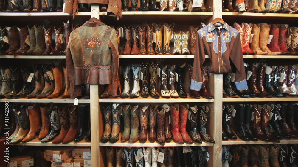 wall of cowboy boots at a western wear store