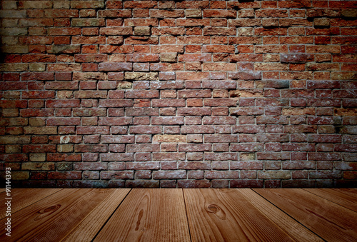 Conceptual old vintage brick wall and wood floor