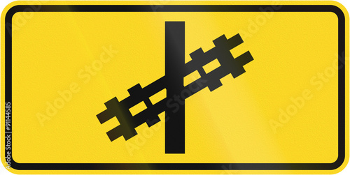 Fotografie Warning road sign in Canada - Diagonal level crossing without barrier