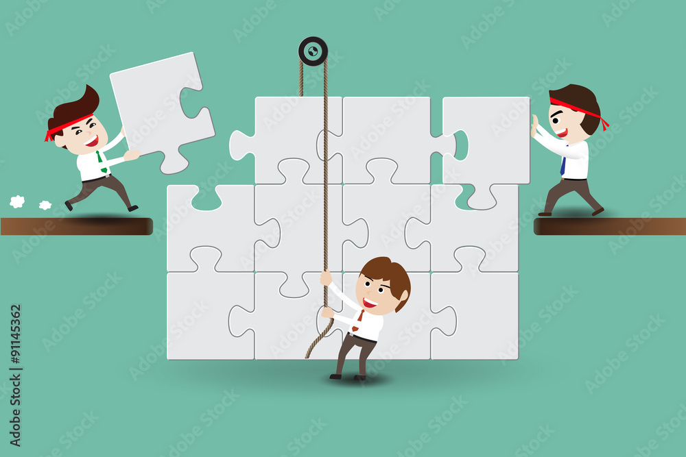 Teamwork, business men assembling pieces of a puzzle Teamwork, business men assembling pieces of a puzzle