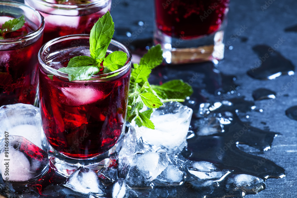 Pomegranate drink with mint and ice, selective focus Pomegranate drink with mint and ice, selective focus