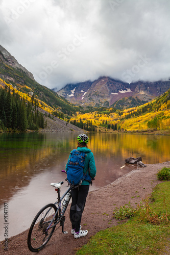 Cyclist at Maroon Bells in Fall
