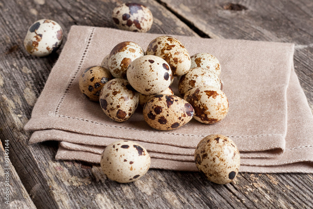 Quail eggs on rustic wooden table Quail eggs on rustic wooden table