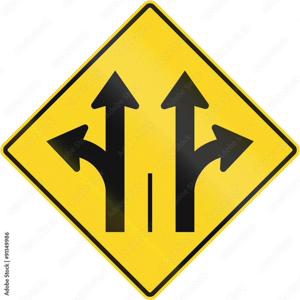 Warning road sign in Quebec, Canada - Two lanes with straight and turn lane Warning road sign in Quebec, Canada - Two lanes with straight and turn lane