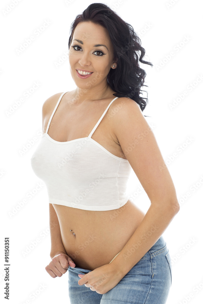 Attractive Young Pin Up Model Wearing Blue Jeans and a Crop Top Attractive Young Pin Up Model Wearing Blue Jeans and a Crop Top