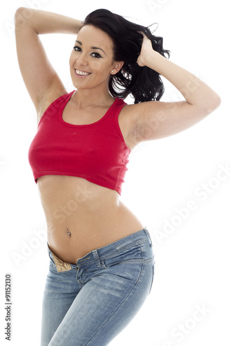 Attractive Young Hispanic Woman Posing Pin Up In Jeans and a Red photo