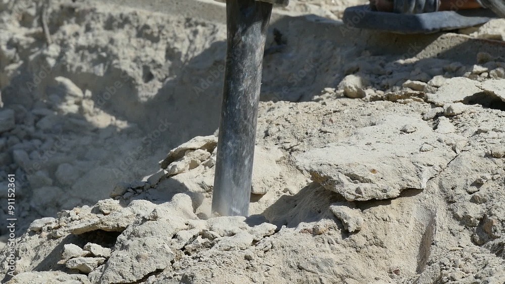worker using jackhammer worker using jackhammer
