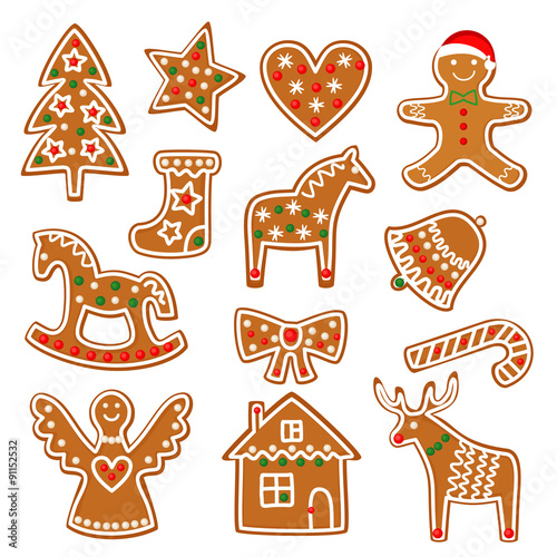 Christmas cookies collection with gingerbread and cookies figures isolated on white background - xmas tree, candy cane, angel, bell, sock, gingerbread men, star, heart, deer, rocking horse