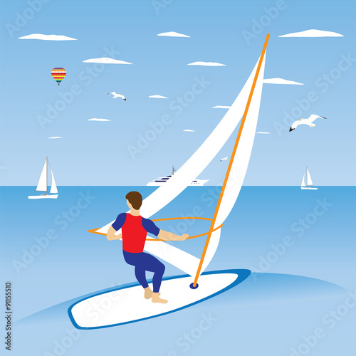 Windsurfer on ocean wave.
