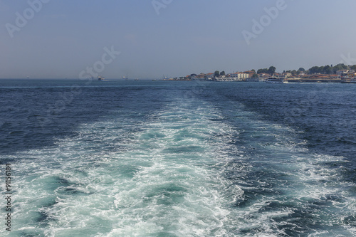 Waves and foam from a ship ...