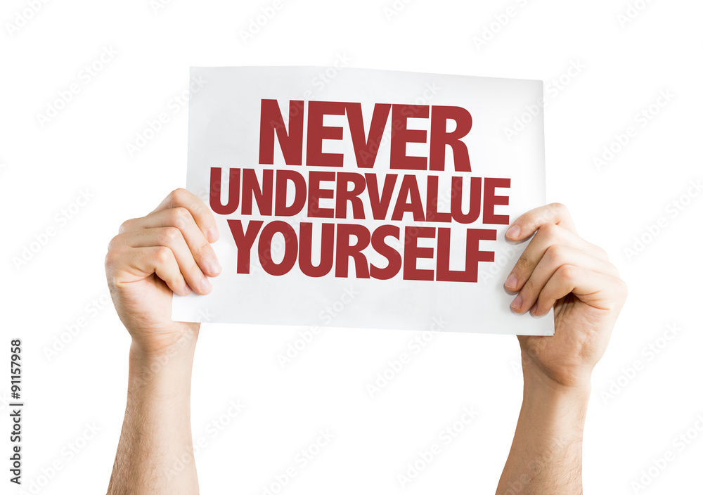 Never Undervalue Yourself placard isolated on white Never Undervalue Yourself placard isolated on white