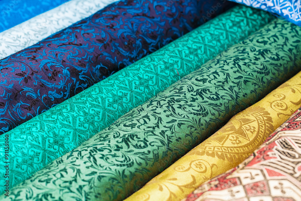 Rolls of fabric and textiles in a factory shop Rolls of fabric and textiles in a factory shop
