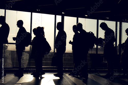 Fototapeta kuchenna people on queue with silhouette
