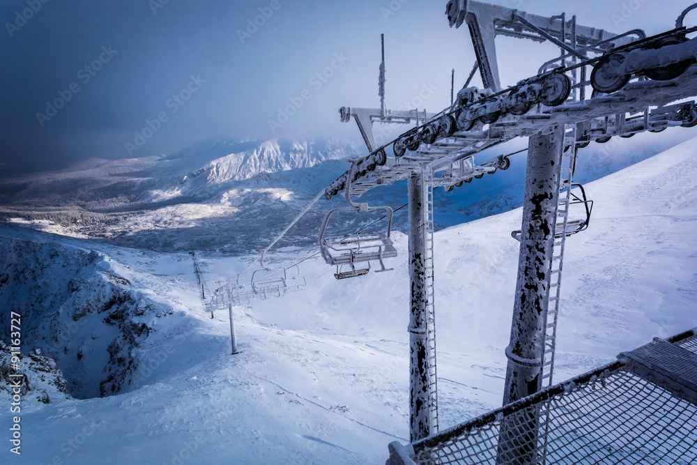 Frozen cableway in the mountains Frozen cableway in the mountains