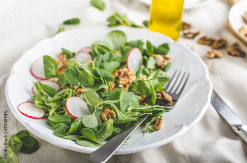 Lambs lettuce salad with walnuts and radish