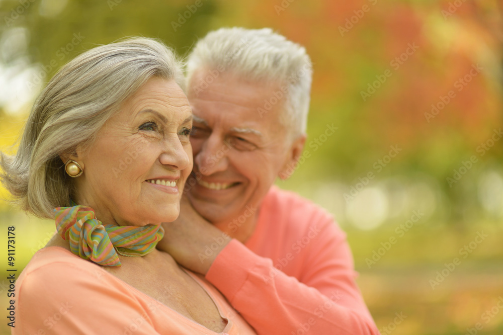 Elderly couple smilling together