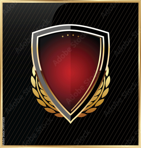 Shield with a golden frame