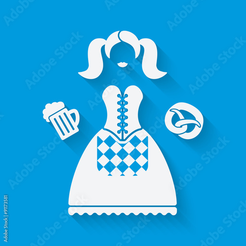 Girl in national dress with beer mug and pretzel
