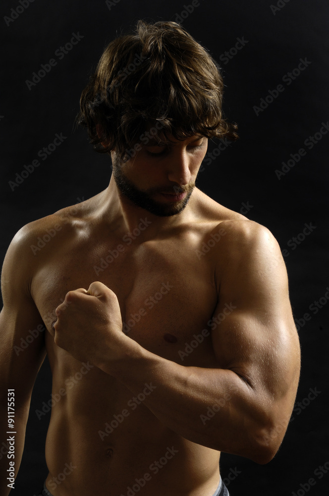 Naklejka premium portrait of a man with biceps