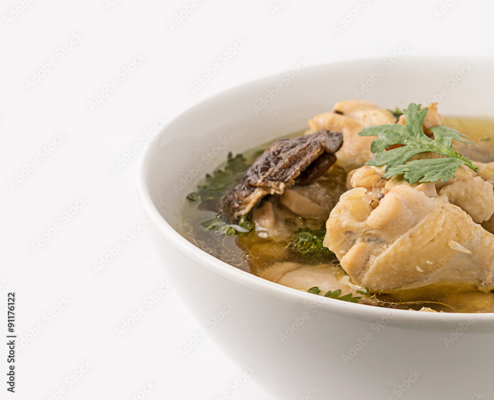 Traditional chicken broth on white background Traditional chicken broth on white background