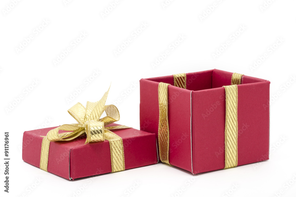 Obraz premium christmas gift box with a gold ribbon bow