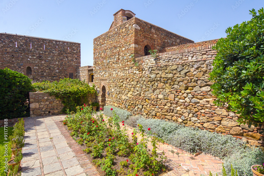 Courtyards and gardens of the famous Palace of the Alcazaba in Malaga, Spain