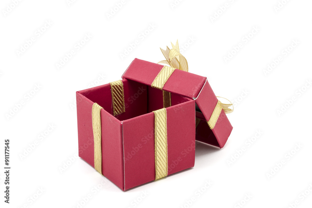 Fototapeta premium christmas gift box with a gold ribbon bow