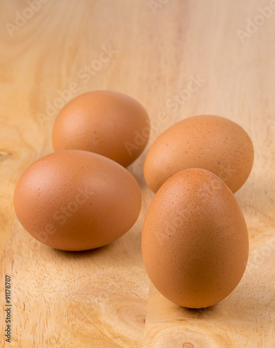 Eggs on wood background