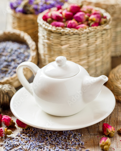 Teapot and herbal tea assortment: lavender, roses and chinese fo