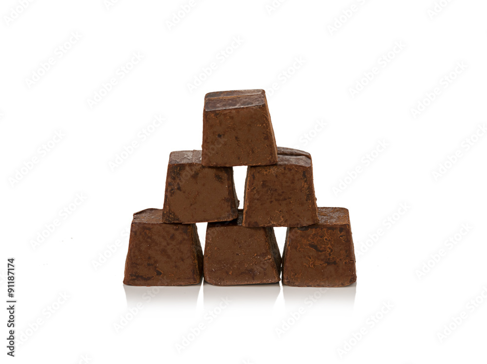 Chocolate pieces on white background Chocolate pieces on white background