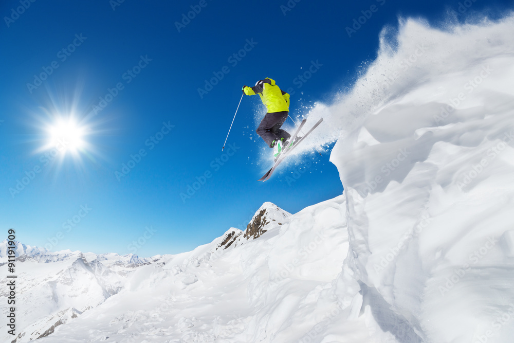 Jumping skier at jump