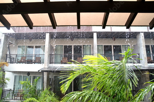 Watching the rain from hotel balcony